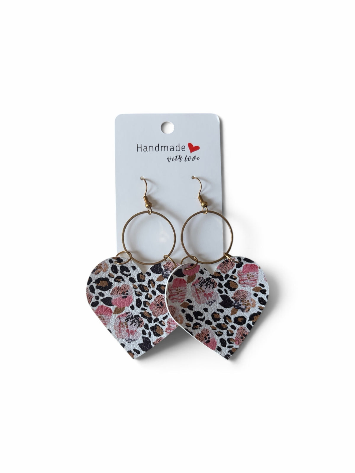Roselee Glitz heart-shaped leather dangle earrings with animal print and floral patterns on gold-toned hoops.