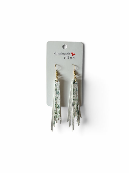 Roselee Glitz handcrafted faux leather tassel earrings featuring a green eucalyptus botanical print and gold hooks.