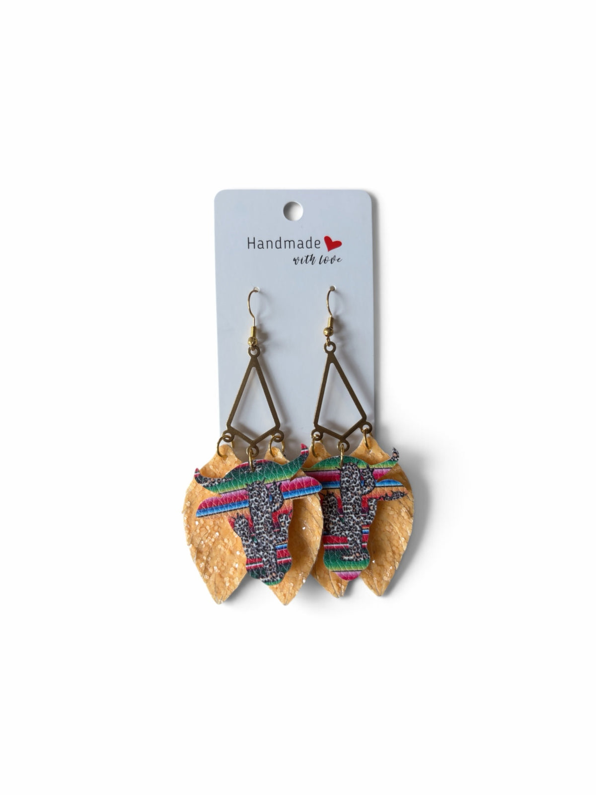 Roselee Glitz western bull head dangle earrings with tan faux leather leaves and multi-colored serape print accents.