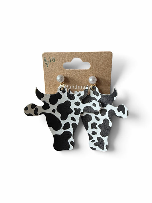 Roselee Glitz cow-shaped dangle earrings with black and white spotted pattern and faux pearl stud accents.