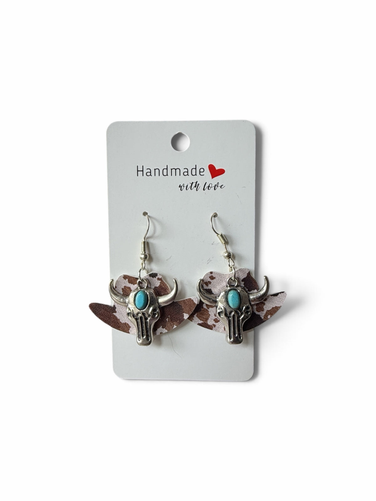 Roselee Glitz Western cowgirl hat earrings with brown cow print faux leather, silver steer skull, and turquoise stone.