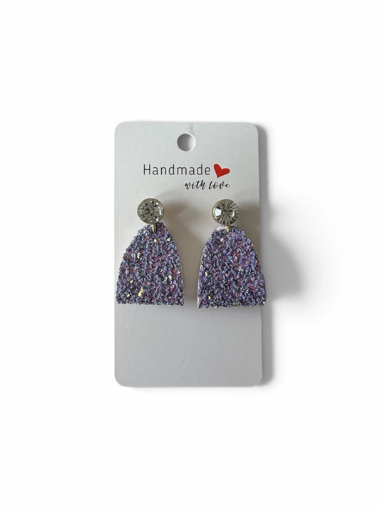 Roselee Glitz handmade lavender glitter arch dangle earrings with crystal-encrusted stud tops on a display card.