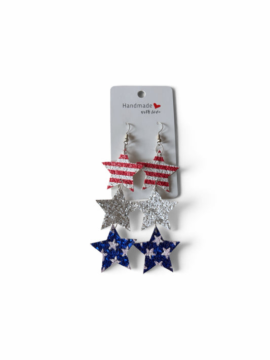 Roselee Glitz triple layered star dangle earrings in red, white, and blue glitter faux leather for patriotic events.