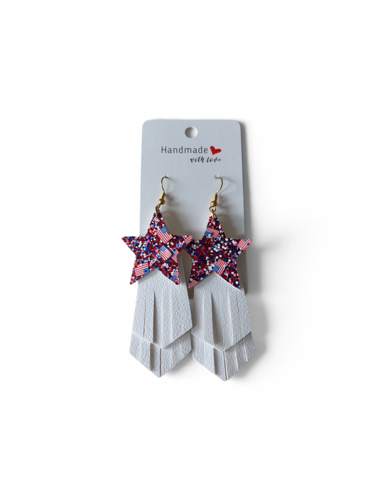 Roselee Glitz handmade patriotic star dangle earrings with red, white, and blue glitter and white layered fringe.