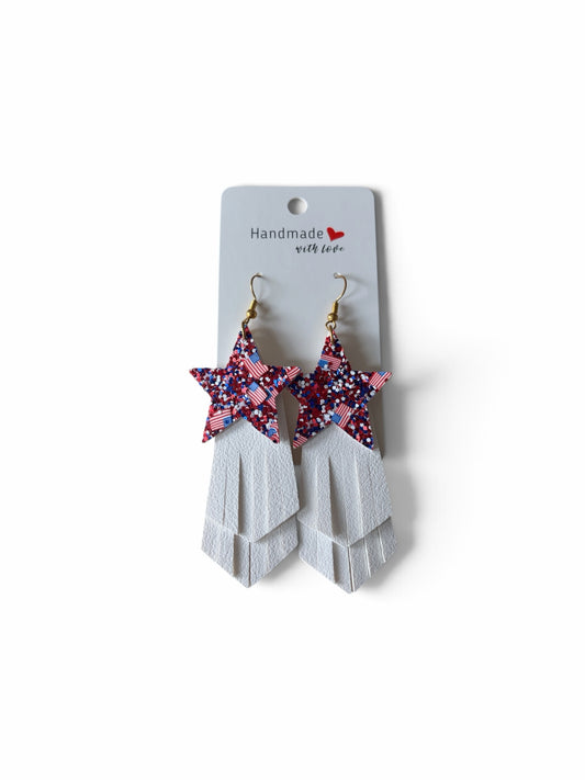 Roselee Glitz handmade patriotic star dangle earrings with red, white, and blue glitter and white layered fringe.