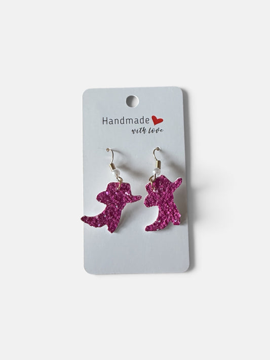 Roselee Glitz pink glitter cowboy boot dangle earrings with hook backings on a handmade display card.