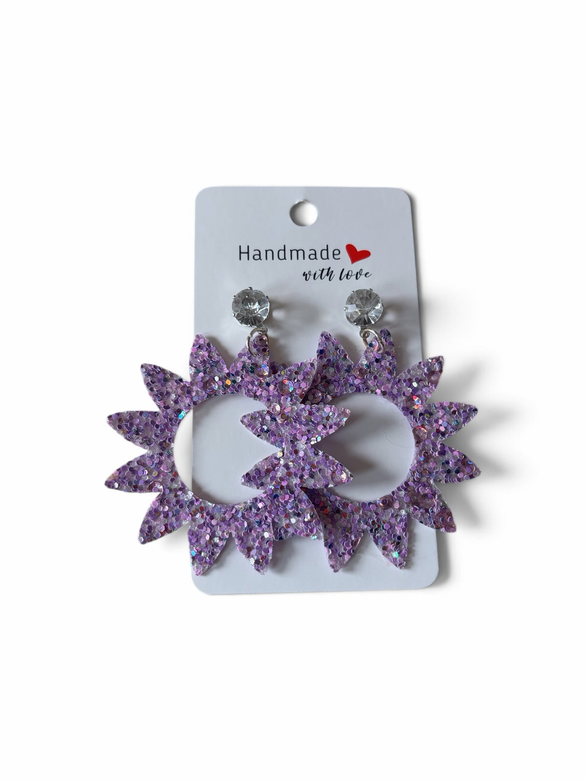 Roselee Glitz purple glitter starburst dangle earrings with crystal studs on a handmade display card.