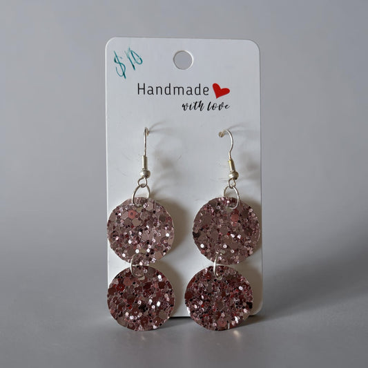 Roselee Glitz handmade rose gold glitter double circle dangle drop earrings on a display card