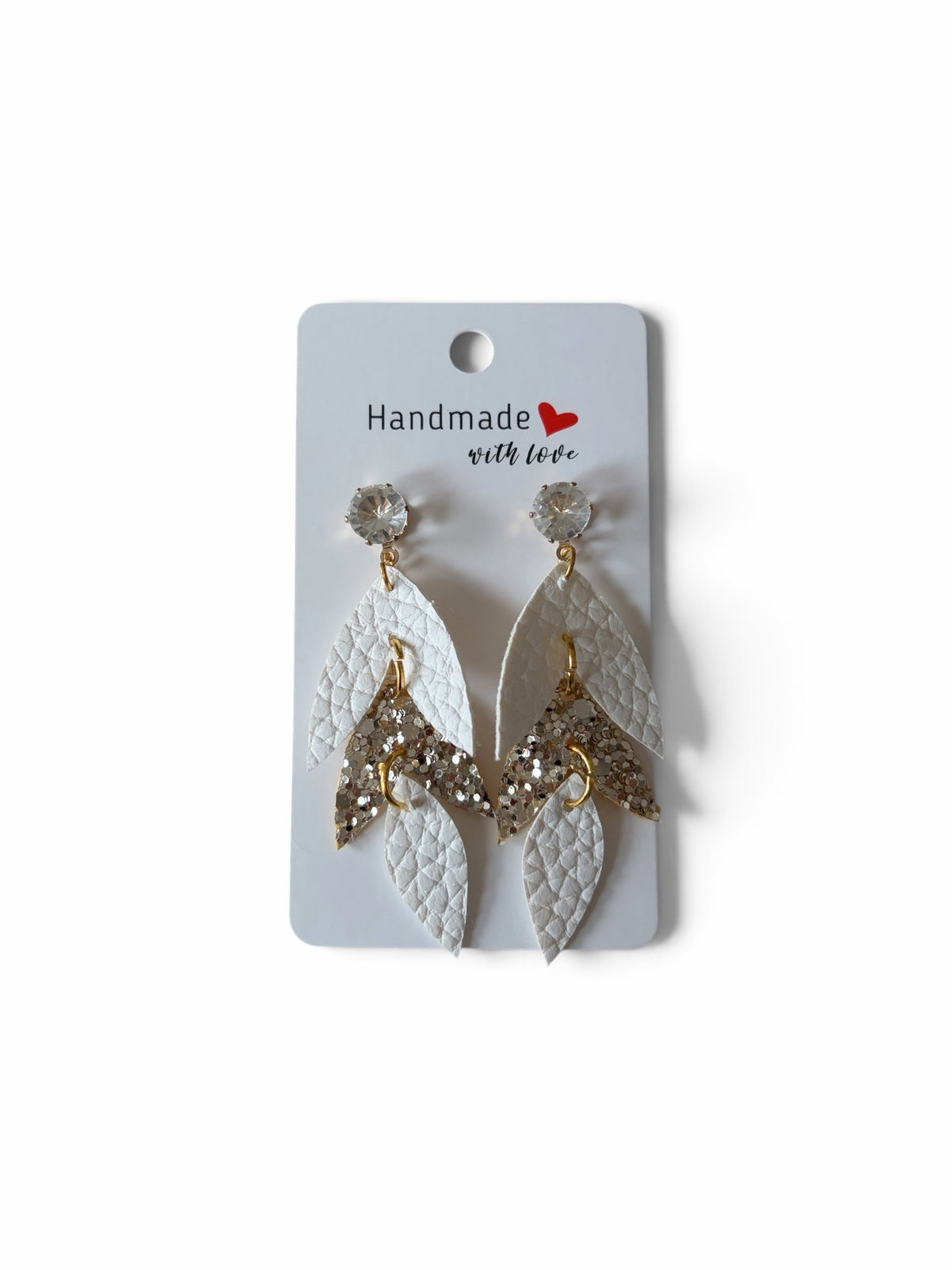 Roselee Glitz handmade layered leaf drop earrings in white faux leather and gold glitter with clear crystal studs.