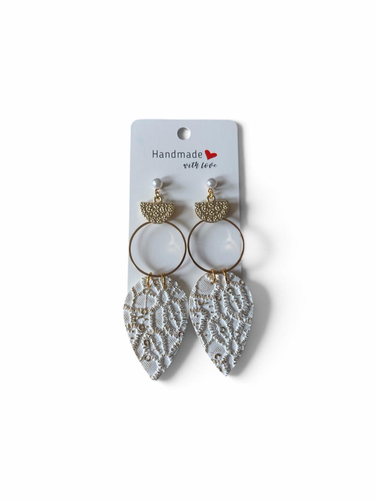 Roselee Glitz handmade teardrop dangle earrings with white lace-textured pendants, gold hoops, and pearl accents.