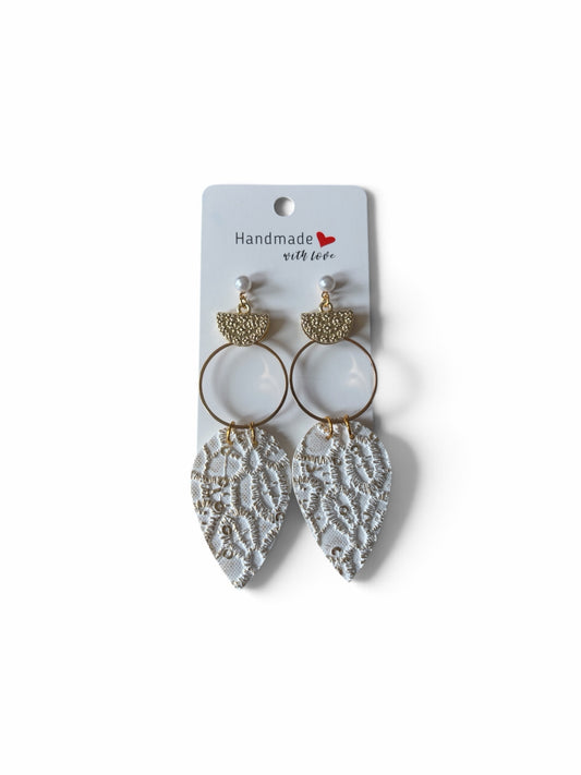 Roselee Glitz handmade teardrop dangle earrings with white lace-textured pendants, gold hoops, and pearl accents.